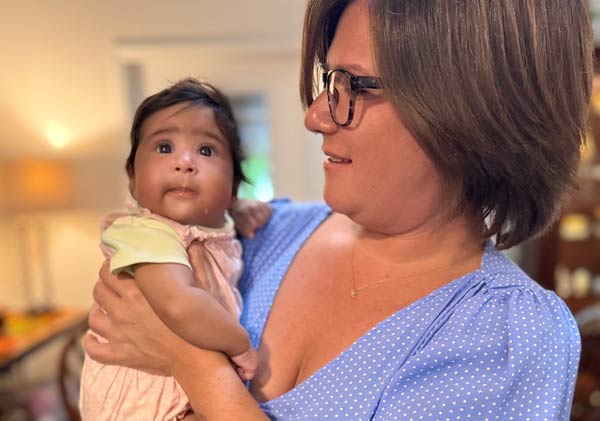 birth mom holds baby